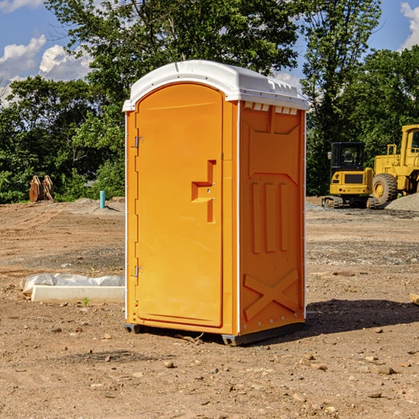 how often are the portable restrooms cleaned and serviced during a rental period in Denmark